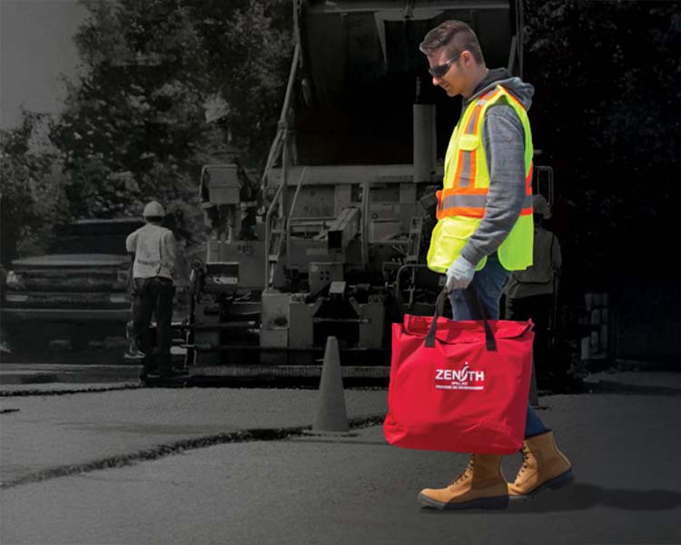 Zenith industrial safety emergency bag carried by a construction worker on an active job site, providing essential gear for hazardous work environments.